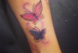 Schmetterling Tattoo an der Wade