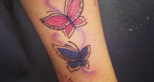 Schmetterling Tattoo an der Wade